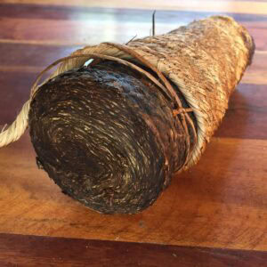 Fresh Ecuadorian Mapacho tobacco roll prepared for storage